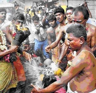 Science versus Miracles: Breaking coconuts on the head